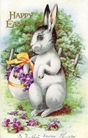 free printable greeting card Easter bunny carrying flower basket made of an Easter egg